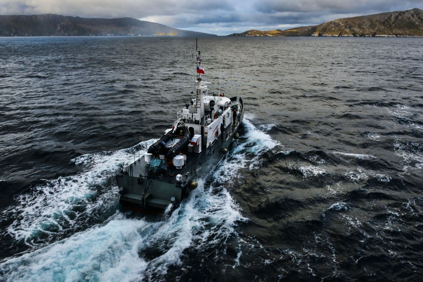 Aerial view of fishing vessels along a coastline
