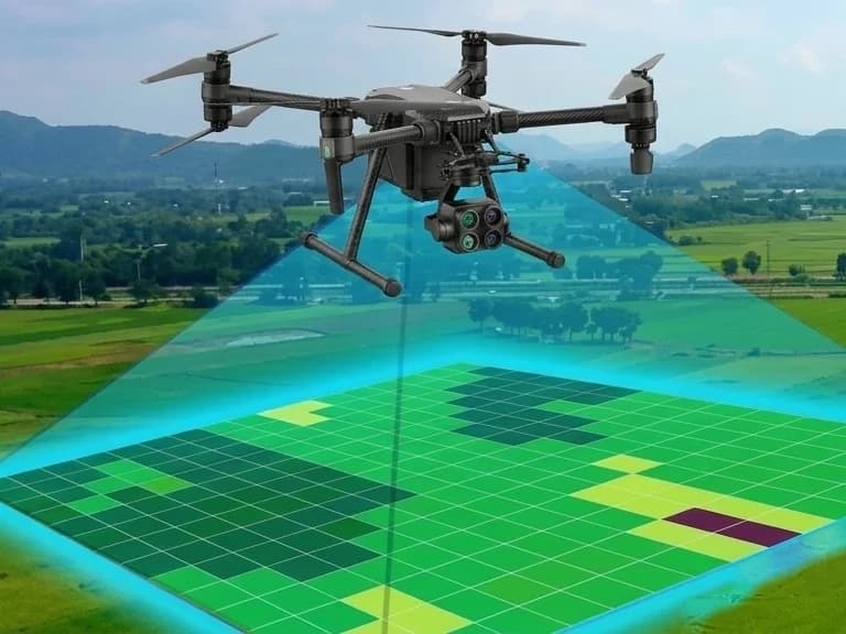 Survey drone capturing a village land parcel grid over farmland